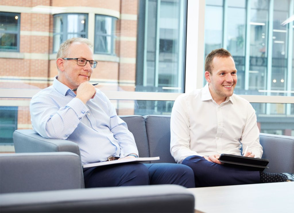 Sentio working with a client on a deal